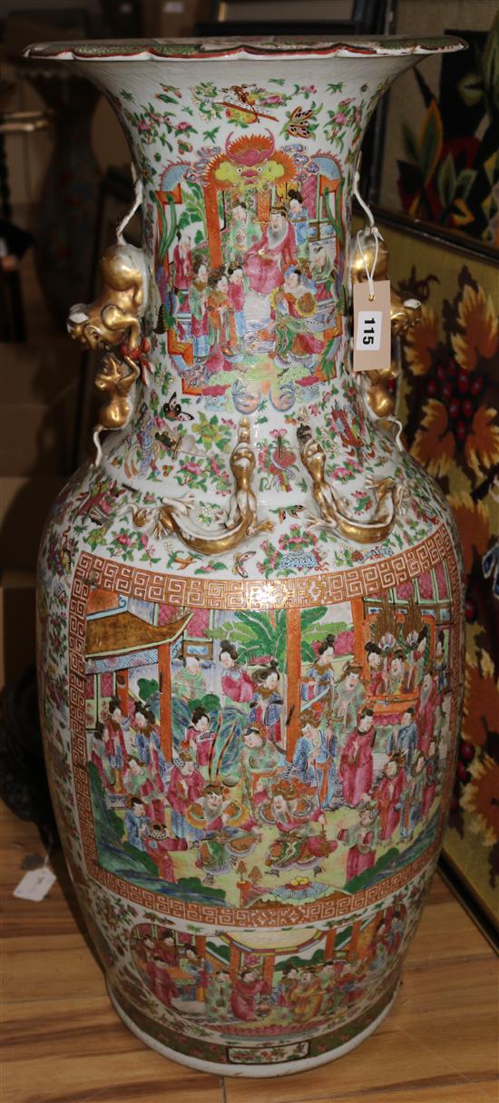 A large Canton floor vase, broken & rivet repaired with carved and pierced hardwood stand